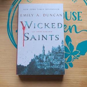 Wicked Saints paperback book by Emily Duncan
